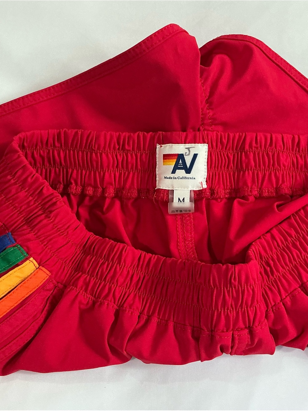 Aviator Nation Red Women's Athletic Shorts with Rainbow Side Stripes - Picture 3 of 3